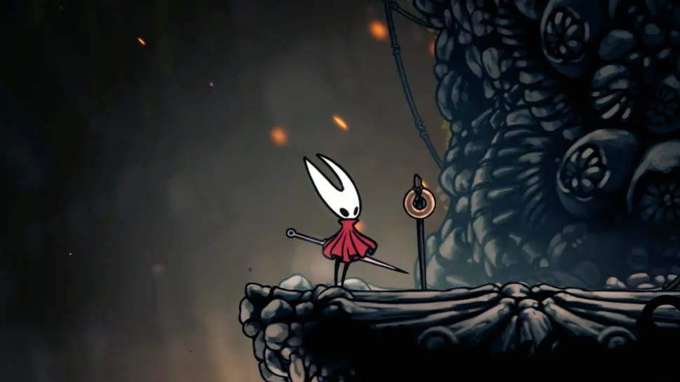 Shakra vendendo mapas em Hollow Knight: Silksong na Base dos Ossos- Dropraro